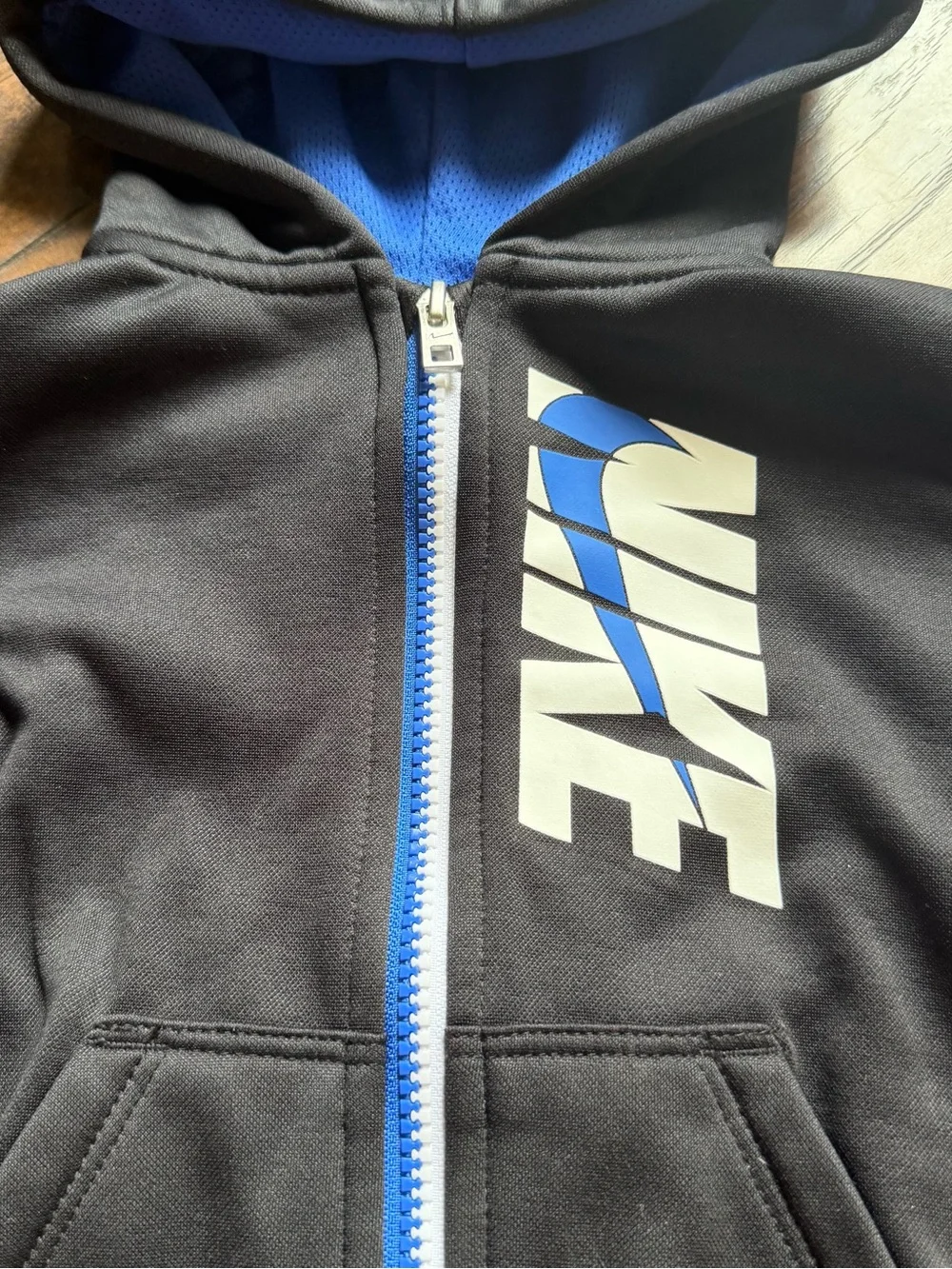 Nike Black Hoodie with Blue Sleeves and White Logo